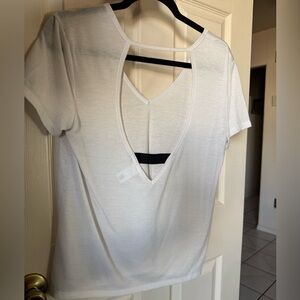 Victoria Sport Elegant White V-Neck Women's Top